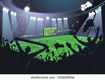 Soccer field and fans. Soccer field in the spotlight. Soccer fans cheer their team.
