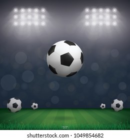 Soccer football ball on grass field of soccer field stadium background. Vector illustration.