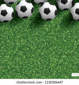 Soccer football ball on green grass field background. Vector illustration.