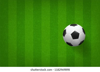 Soccer football ball on green grass field pattern background. Vector illustration.