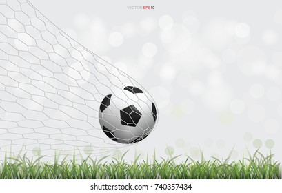 Soccer football ball on green grass field with light blurred bokeh background. Vector illustration.