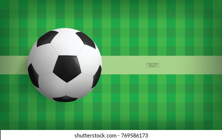 Soccer football ball on green grass pattern of soccer field. Vector illustration.