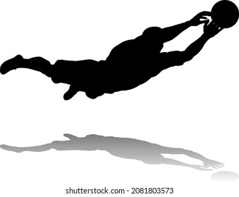 A soccer or football player in silhouette 
