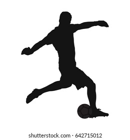 Soccer goalkeeper kicking off the ball, vector silhouette, side view