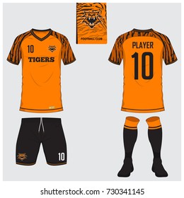 Soccer jersey or football kit, short, sock template for sport club. Football t-shirt mock up. Front and back view soccer uniform with Bengal tiger pattern. Flat football logo on blue label. Vector.