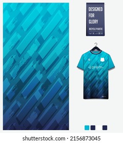 Diseño de patrones de jersey de fútbol. Patrón de pincel sobre fondo azul gradiente para equipo de fútbol, equipo de fútbol, e-sport, baloncesto, plantilla de maqueta de camisetas. Patrón de tejido. Antecedentes abstractos. Vector.