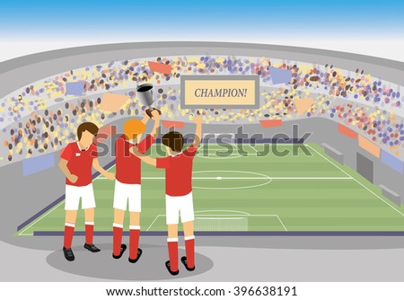 soccer player holding a trophy and celebrating in stadium