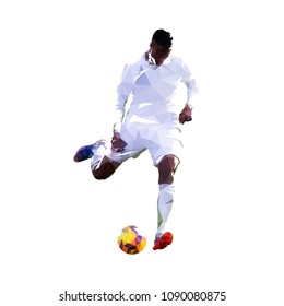 Soccer player kicking ball. European football player abstract polygonal vector illustration. Low poly sport icon