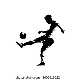 Soccer player kicking ball, isolated vector silhouette, ink drawing