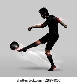 soccer player in kicking a half-volley soccer ball 