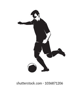 Soccer player kicks the ball