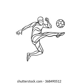 Soccer player silhouette kicks the ball