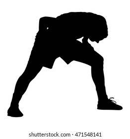 Soccer player stretching silhouette vector isolated on white background. High detailed football player silhouette cutout outlines. Strain, racking, warming up.
