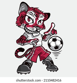 Soccer player tiger dribbling the ball at the soccer cup 2022 in Qatar. Tiger football player mascot of Qatar