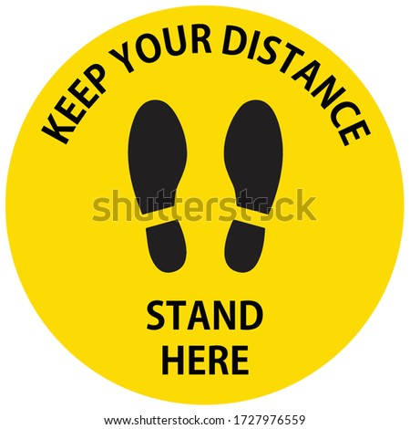 Social distancing concept for preventing coronavirus covid-19 with black wording keep your distance and stand here and footprint on yellow circle background