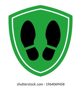 Social distancing corona virus protective footprint in green shield floor sticker sign