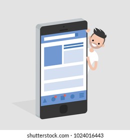 Social media account. Isometric mobile device. Young smiling character peeking out from behind the smartphone. Flat editable vector illustration, clip art