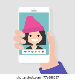 Social media icons. Reactions: thumbs up, thumbs down, emoji. Rate the photo. Millennial character. Hand holding a smartphone. Flat editable vector illustration, clip art