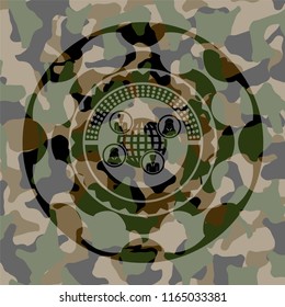 social network icon inside camouflaged emblem