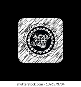 social network icon inside chalkboard emblem on black board