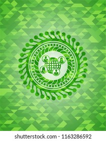 social network icon inside realistic green emblem. Mosaic background