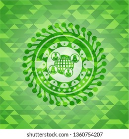 social network icon inside realistic green mosaic emblem