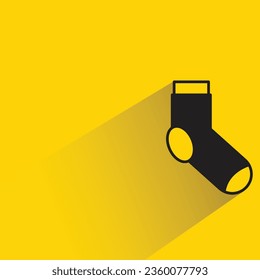 calcetín con sombra sobre fondo amarillo