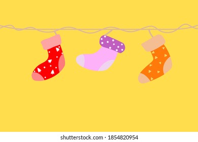 Socking of Santa is hanging on the line is a decoration element, Merry Christmas greeting