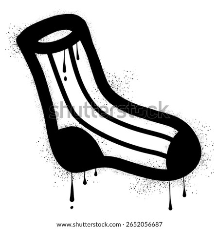 Socks with black spray paint graffiti