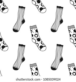 Socks. Black and white seamless pattern for coloring book and page. Knitted clothes.