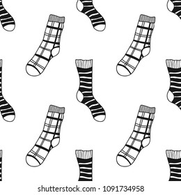 Socks. Black and white seamless pattern for coloring book and page. Knitted clothes.