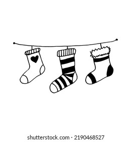 socks for christmas gifts. hanging decor hand drawn in doodle style