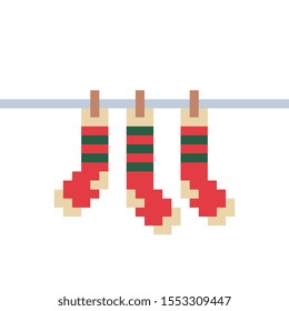 Сhristmas socks, hanging holiday decorations for gifts. Isolated pixel art vector illustration. Design for stickers, mobile app, web and logo. 8-bit sprite.
