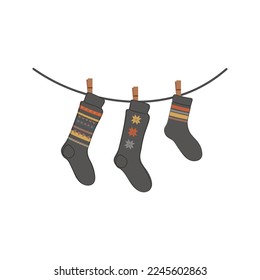 Calcetines colgados en una tela de una línea de arte continua