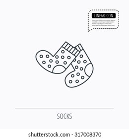 Socks icon. Baby underwear sign. Clothes symbol. Linear outline icon. Speech bubble of dotted line. Vector