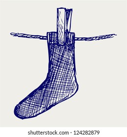 Socks made of a clap in clothesline. Doodle style