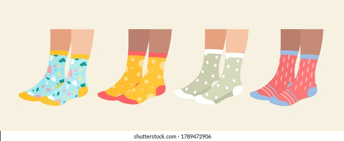 Socks on legs vector illustration set. Cartoon flat collection of underwear accessories, sock pair with colorful ornament, print and pattern, funny warm socks footwear isolated on white.