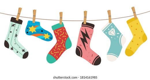Socks on rope. Adult and kids trendy fashion socks with color patterns. Stylish cotton and woolen long and short funny footwear vector colorful doodle modern concept of cute cozy accessories