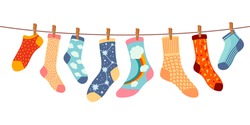 Socks On Rope. Cotton Or Wool Sock Dry And Hang On Laundry String With Clothespins. Children Socks With Textures And Patterns Vector Cartoon. Illustration Wool And Cotton Socks In Rope