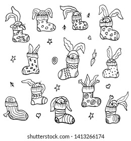 Socks with rabbits set, black outline on white background, vector