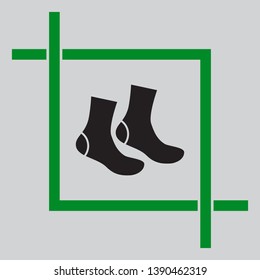 Socks sign. Black icon inside green crop tool at light gray background