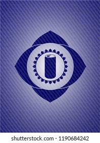 soda can icon inside emblem with denim texture