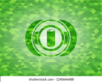soda can icon inside green emblem with mosaic background
