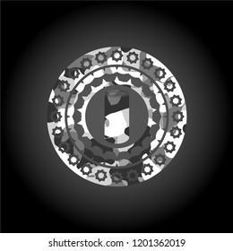 soda can icon inside grey camo emblem