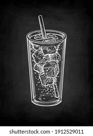 Soda glass with ice and drinking straw. Chalk sketch of cola on blackboard background. Hand drawn vector illustration. Retro style.