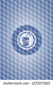 soda icon inside blue badge with geometric pattern background.
