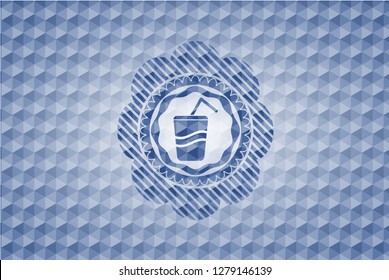 soda icon inside blue badge with geometric pattern background.