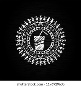 soda icon inside chalk emblem written on a blackboard