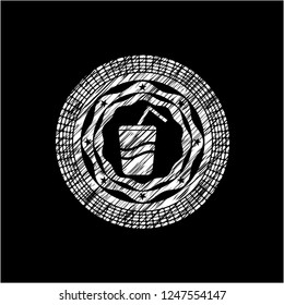 soda icon inside chalk emblem written on a blackboard