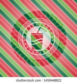 soda icon inside christmas colors emblem.